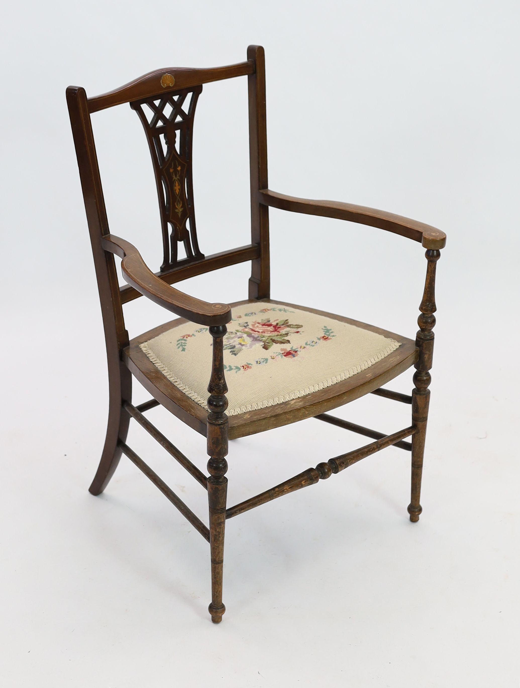 An Edwardian inlaid mahgany elbow chair